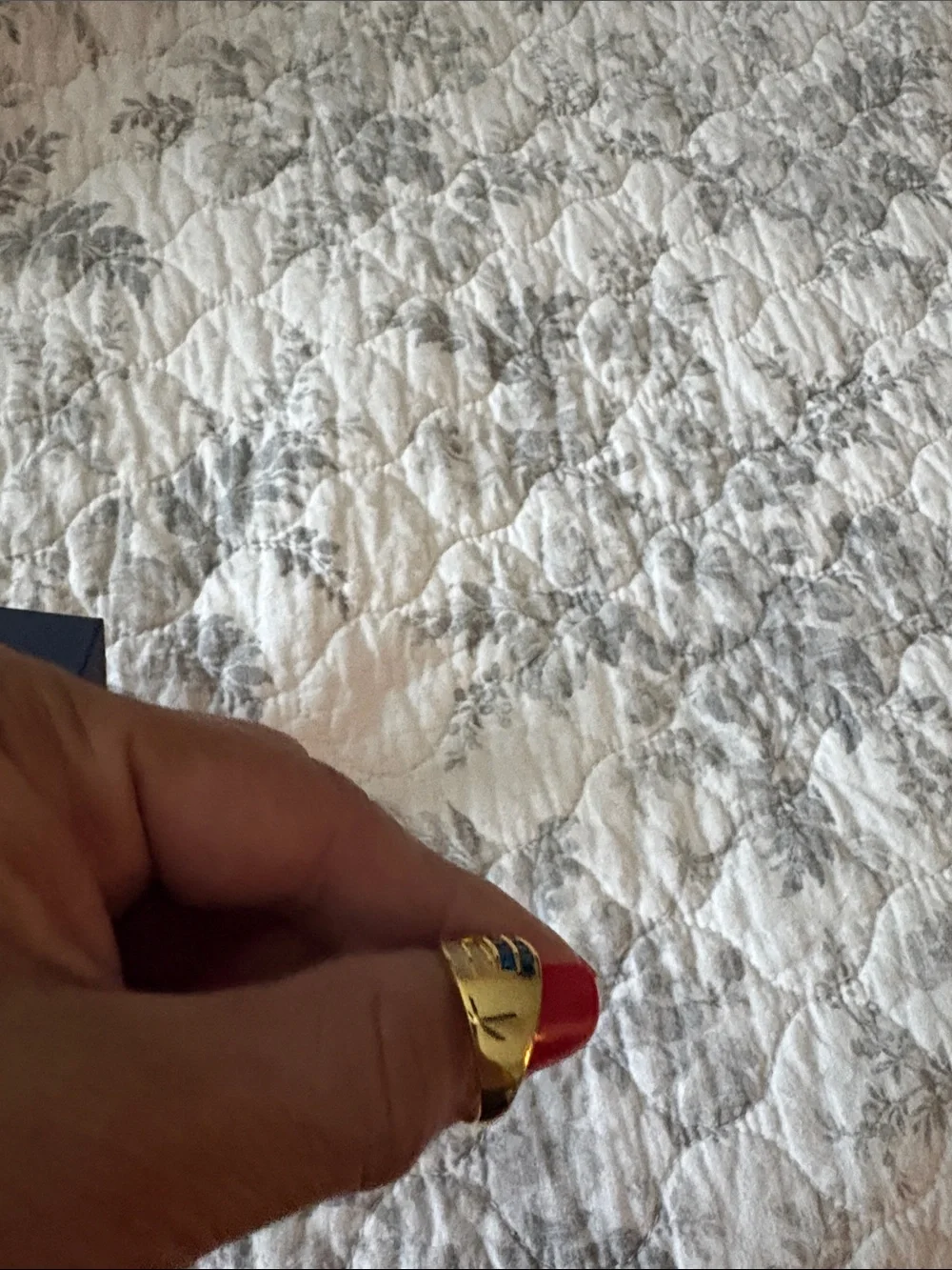 Gold-tone Wave Ring with Blue and Clear Stones